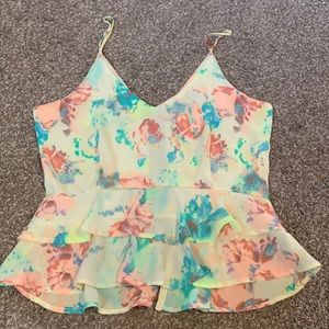 Astr neon floral peplum top with adjustable straps. Size medium